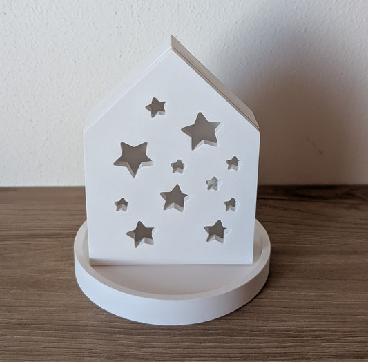 Casetta decorativa con stelle con vassoio rotondo coordinato